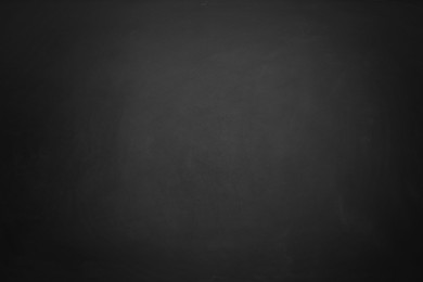 Image of Black chalkboard as background, space for design. Vignette effect