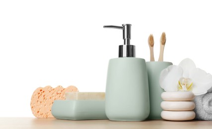 Bath accessories. Different personal care products and flower on wooden table against white background. Space for text