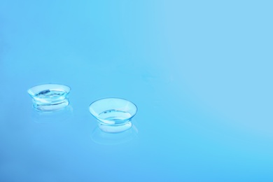 Contact lenses on glass background