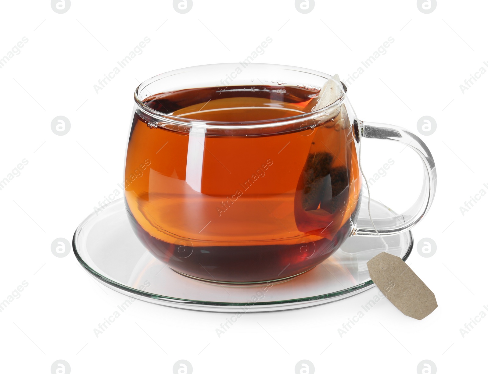 Photo of Brewing aromatic tea. Cup with teabag isolated on white