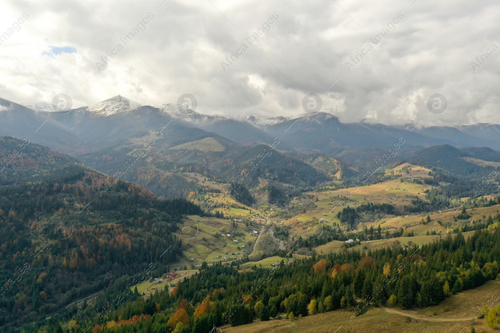 Photo of Aerial view of beautiful mountains on cloudy day