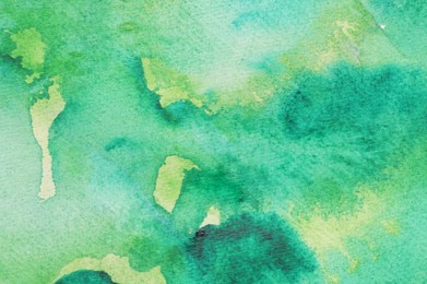 Photo of Abstract green watercolor painting as background, top view