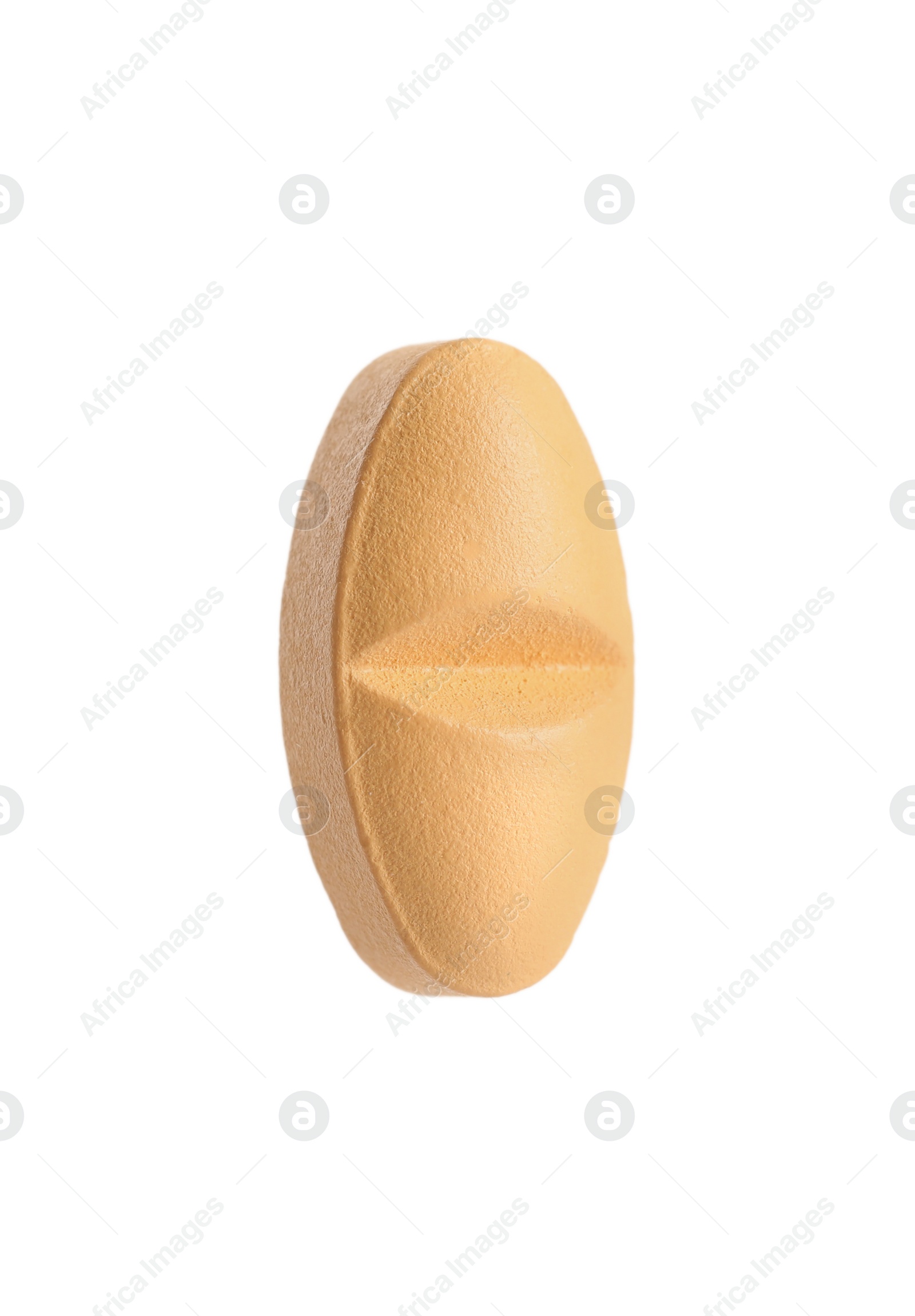 Photo of One pale orange pill isolated on white