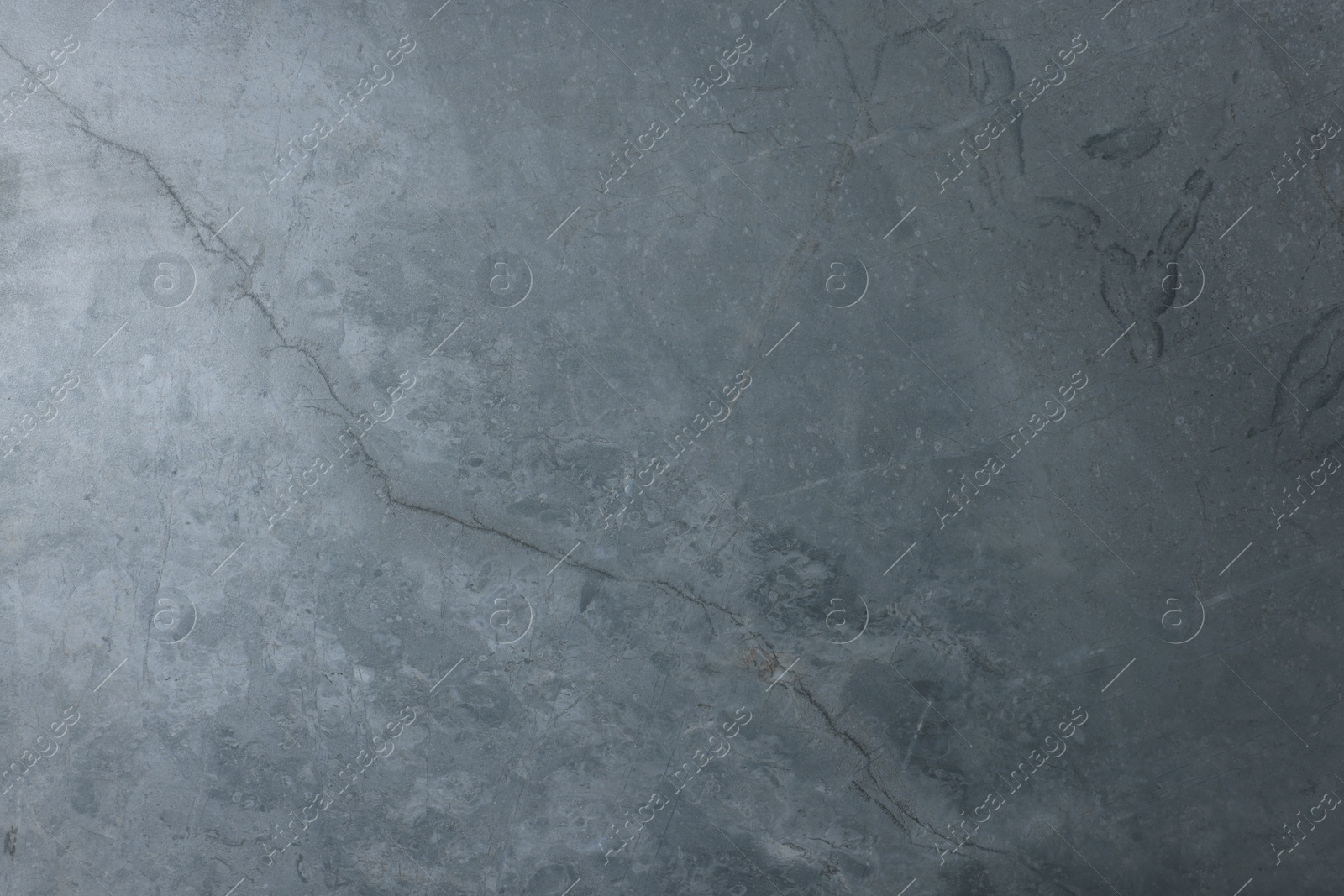 Photo of Beautiful grey stone surface as background, closeup