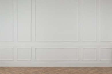 Photo of Blank white wall in room. Space for design