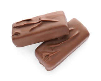 Photo of Two tasty chocolate bars on white background