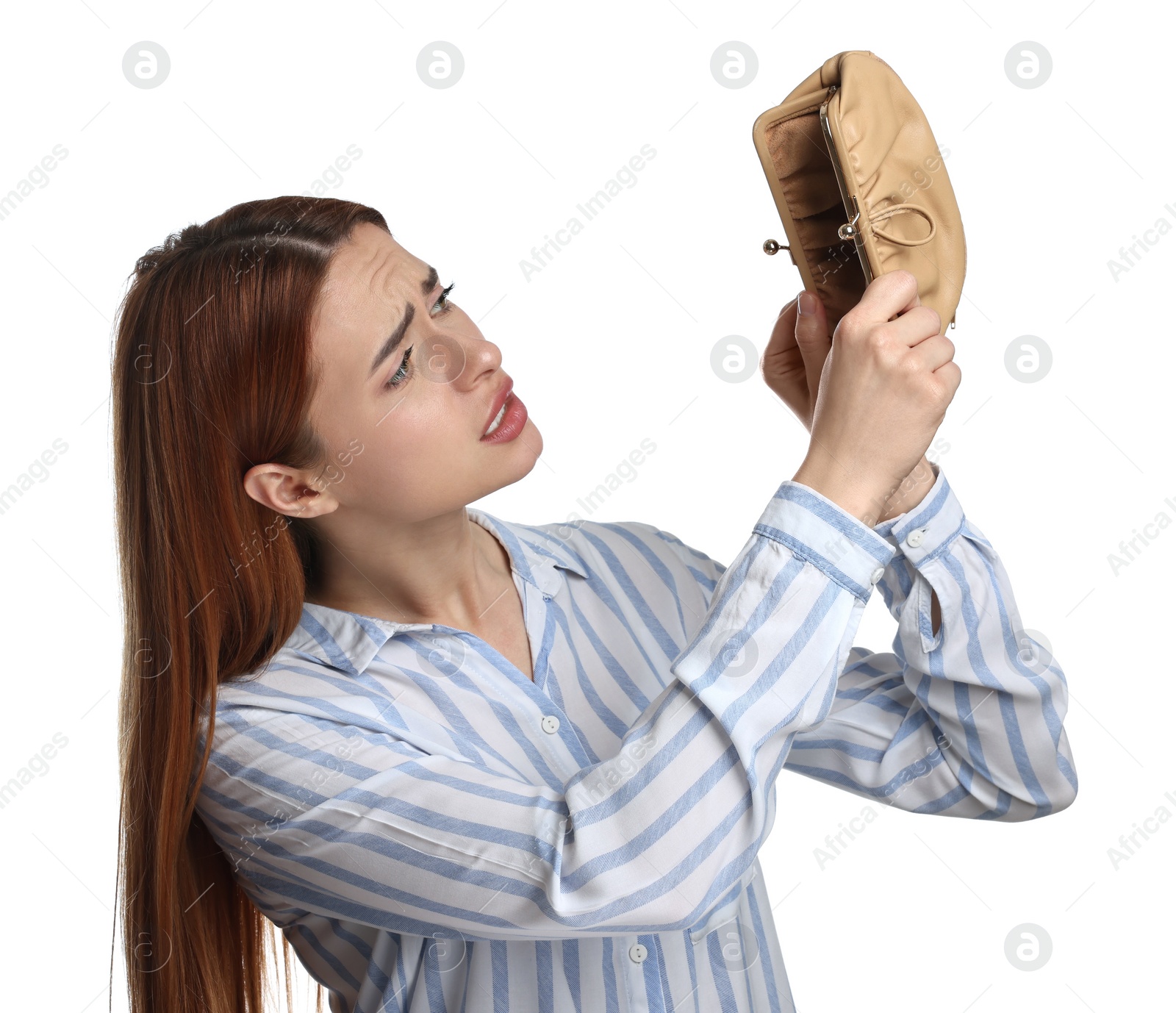 Photo of Upset woman with empty wallet on white background