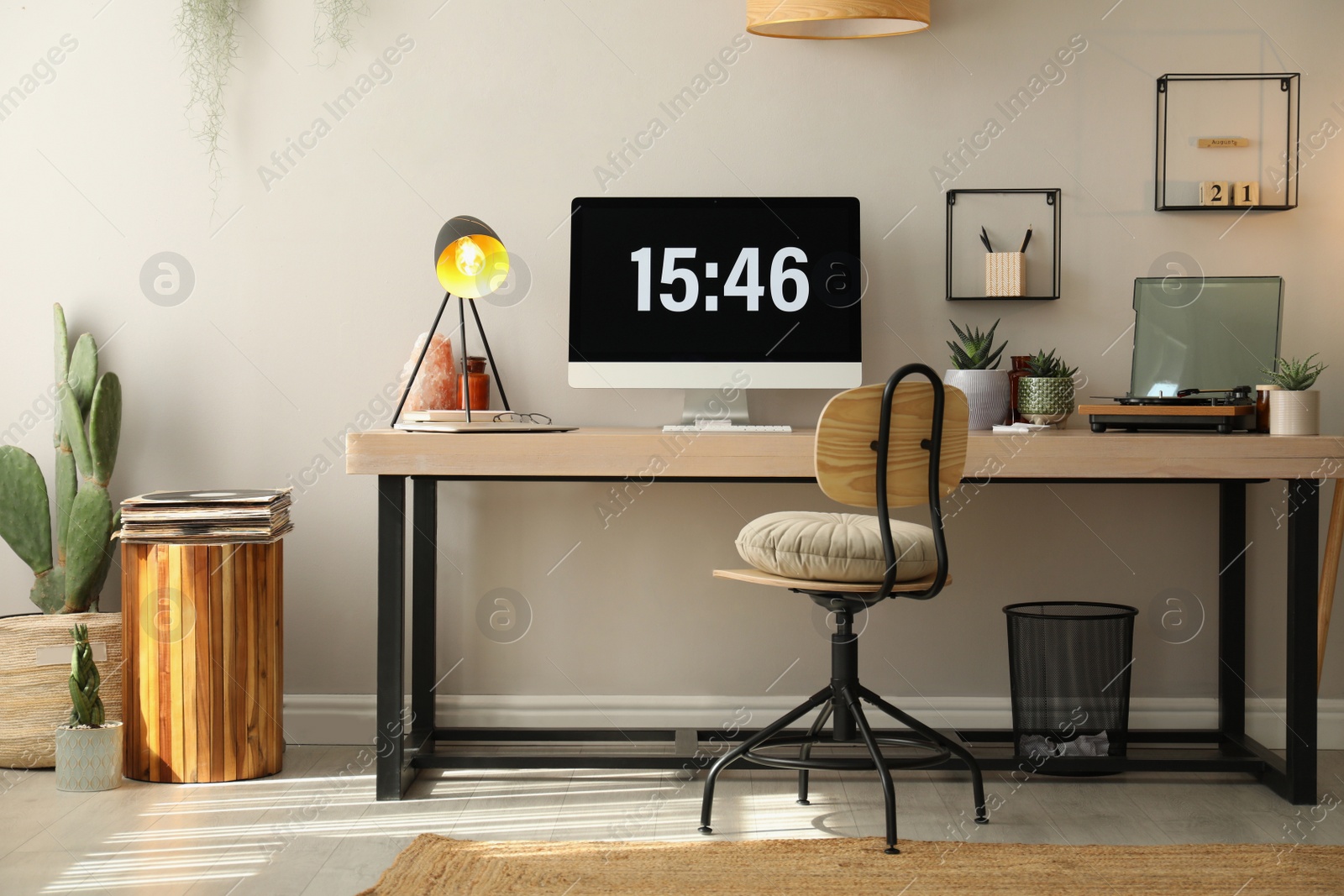 Photo of Room interior with comfortable workplace. Modern computer on wooden desk