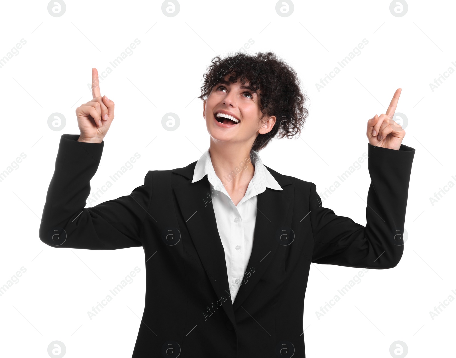 Photo of Beautiful happy businesswoman pointing at something on white background