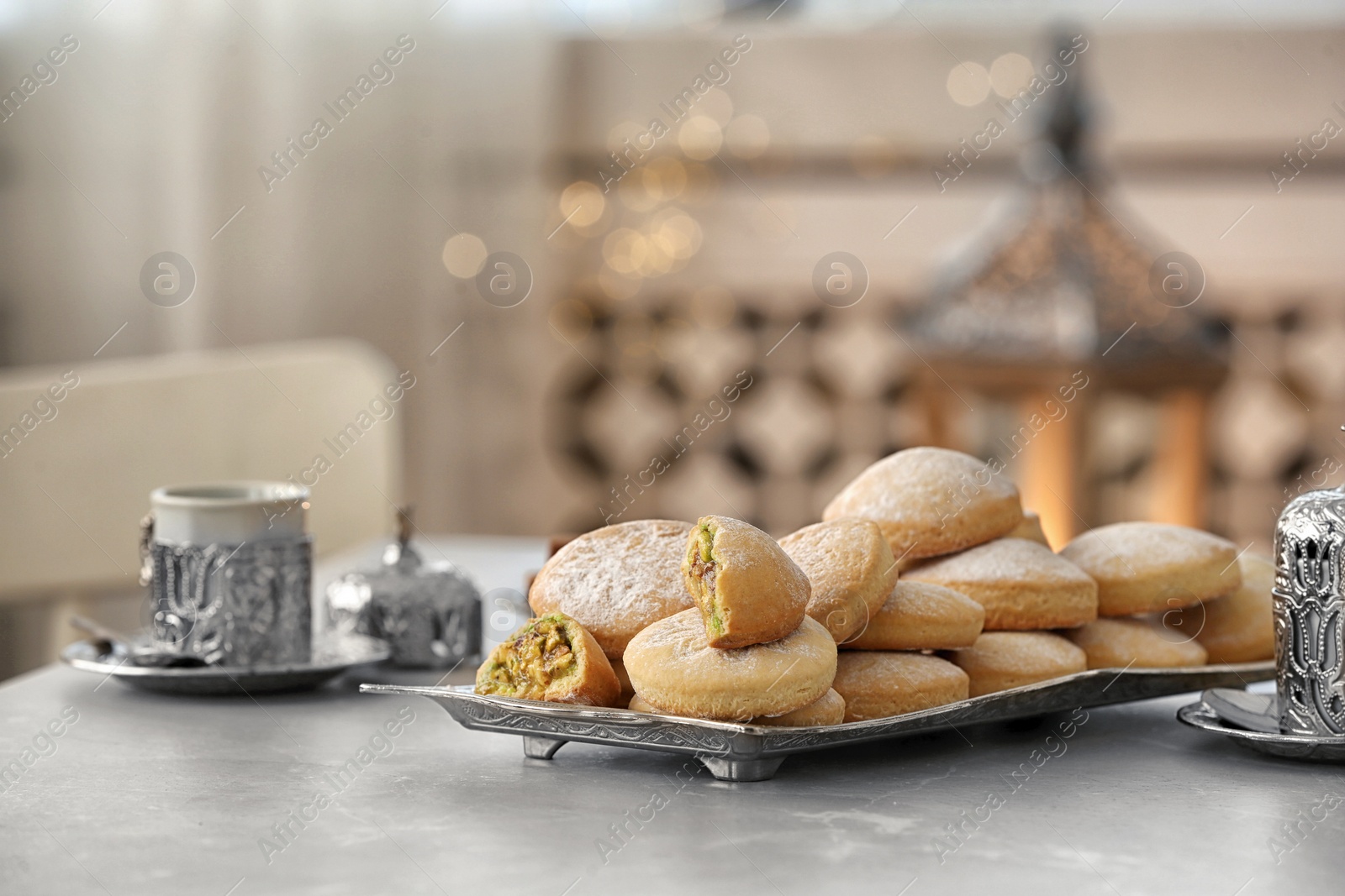 Photo of Traditional Islamic cookies on table, space for text. Eid Mubarak