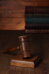 Photo of Law concept. Judge's gavel on wooden table