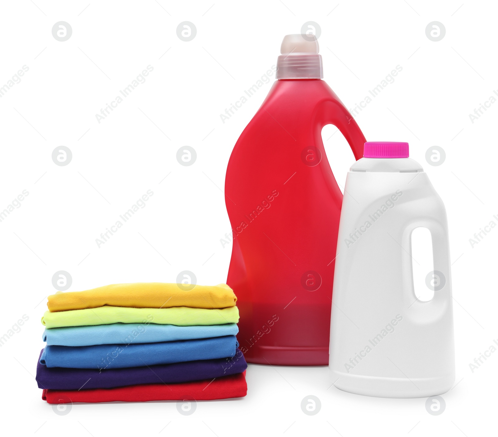 Photo of Stack of baby clothes and laundry detergents isolated on white