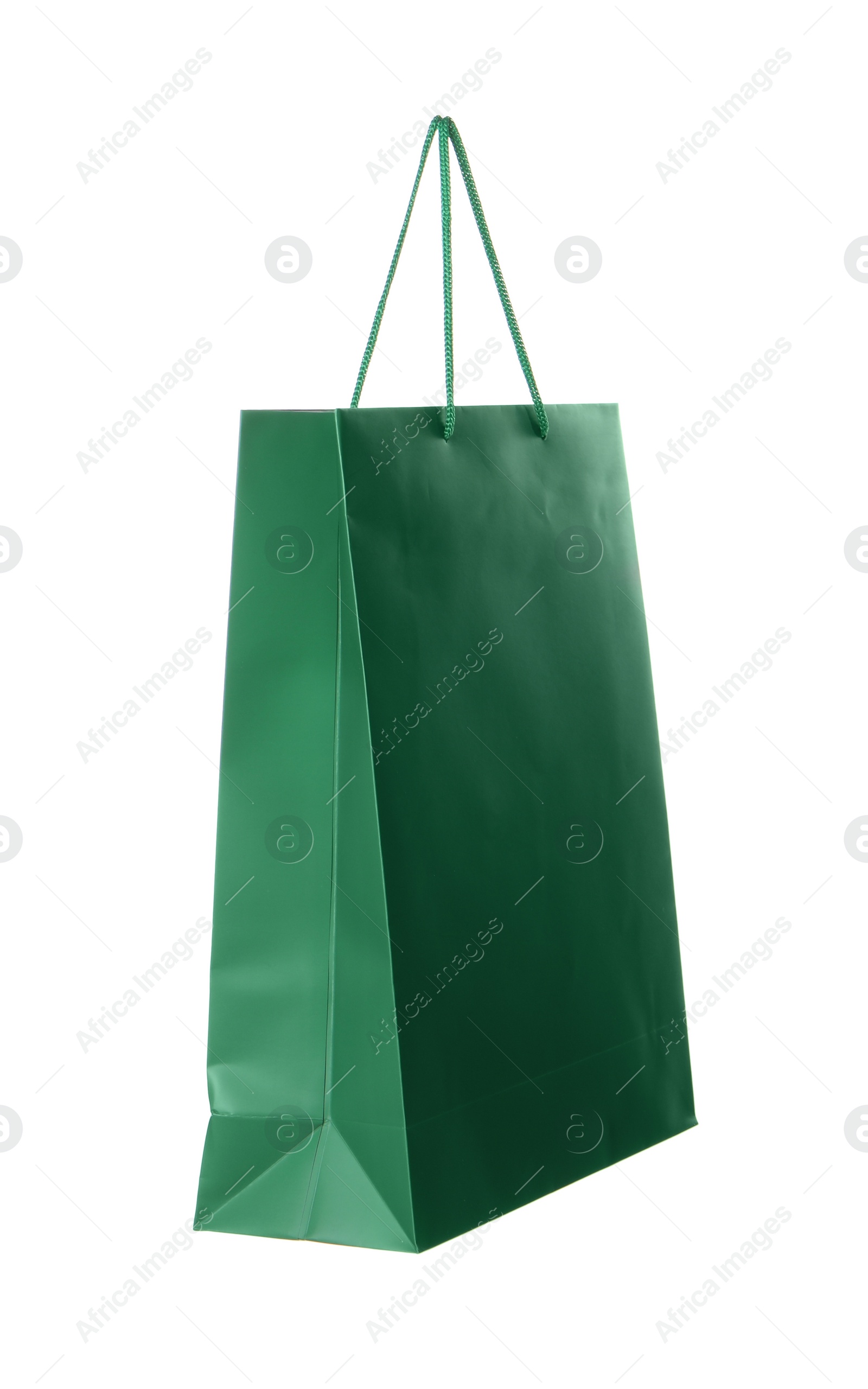 Photo of One green shopping bag isolated on white