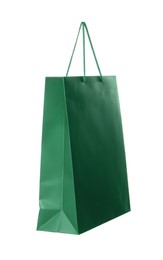 Photo of One green shopping bag isolated on white