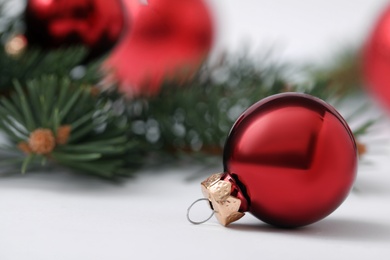 Beautiful Christmas ball on blurred background. Space for text