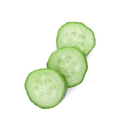 Slices of fresh green cucumber isolated on white, top view