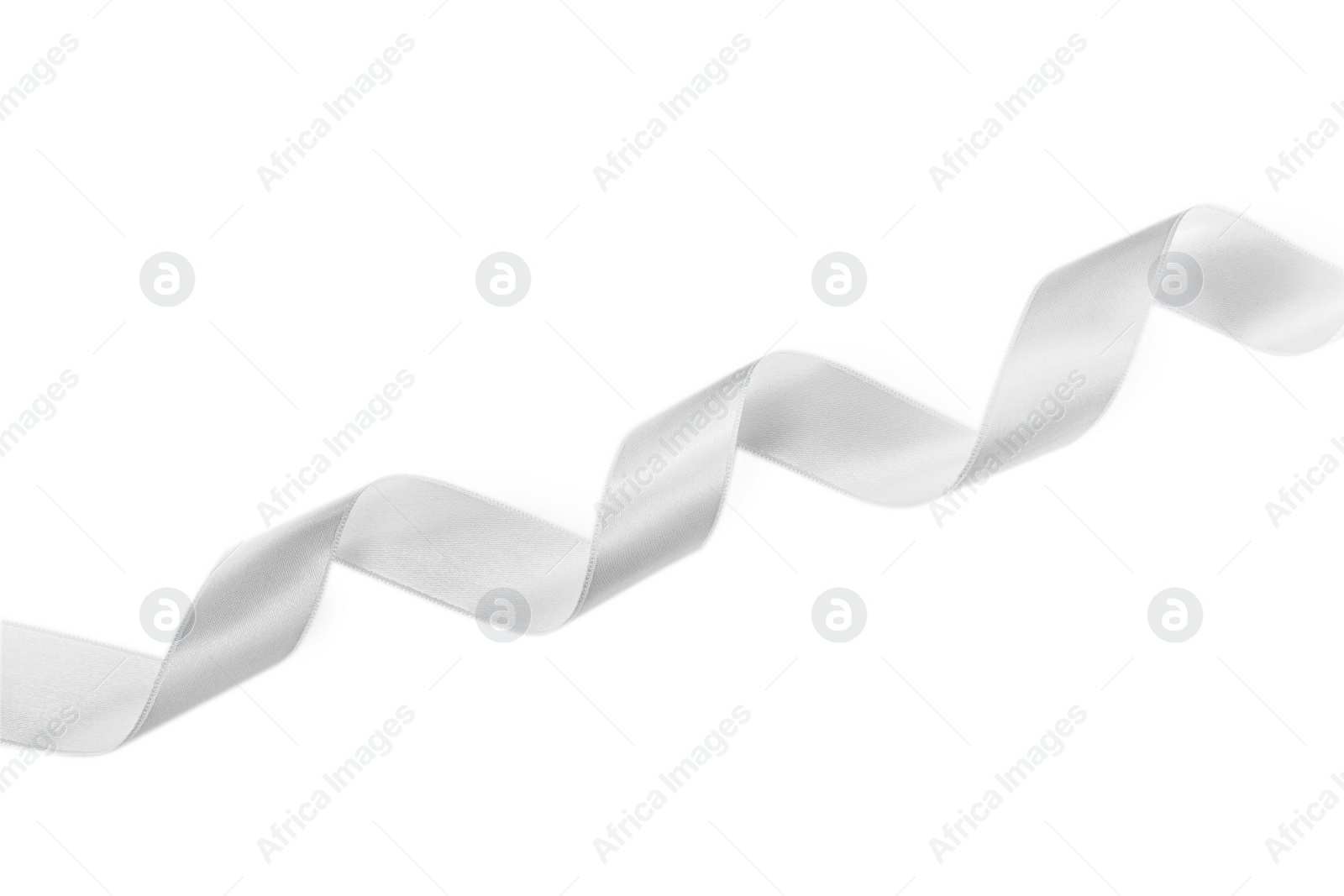 Photo of Satin ribbon on white background, top view