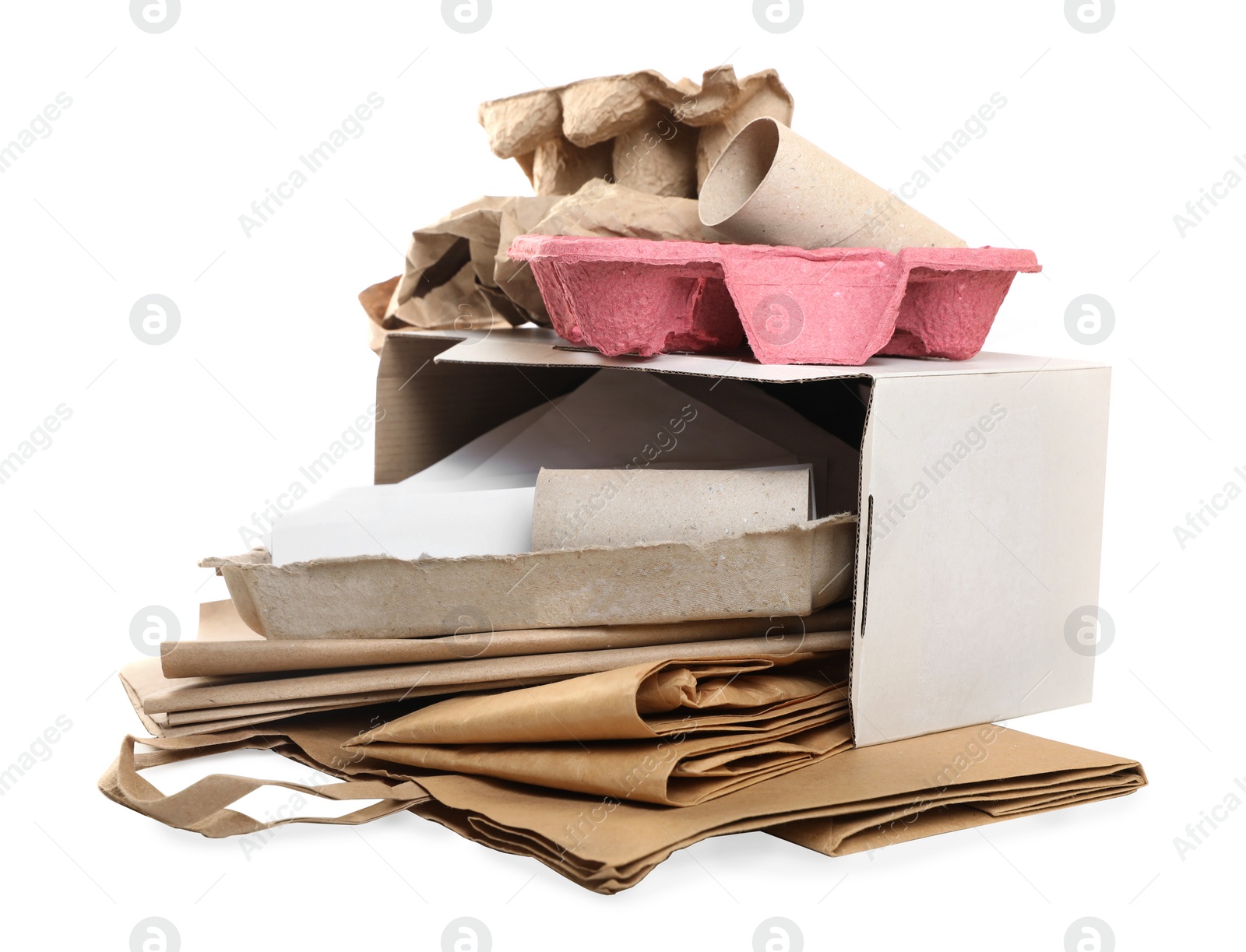 Photo of Stack of different waste paper on white background