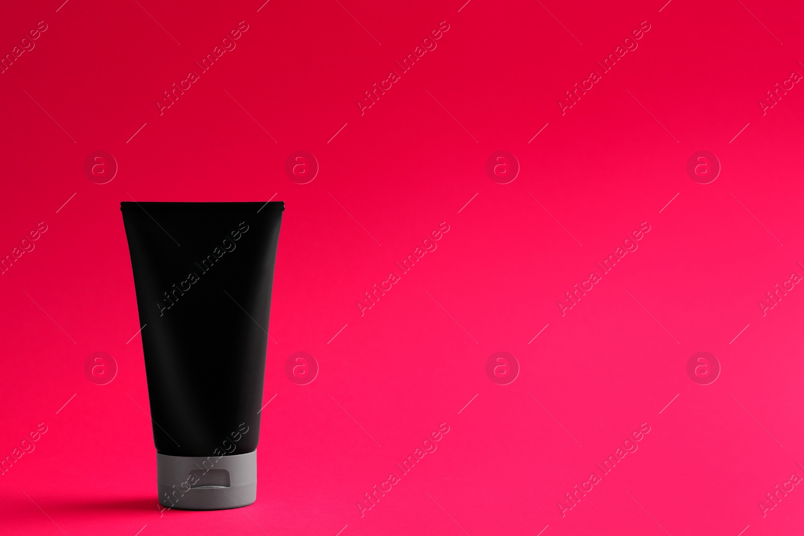 Photo of Men's cosmetic product on color background. Space for design