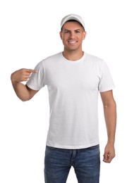 Photo of Happy man in cap and tshirt on white background. Mockup for design