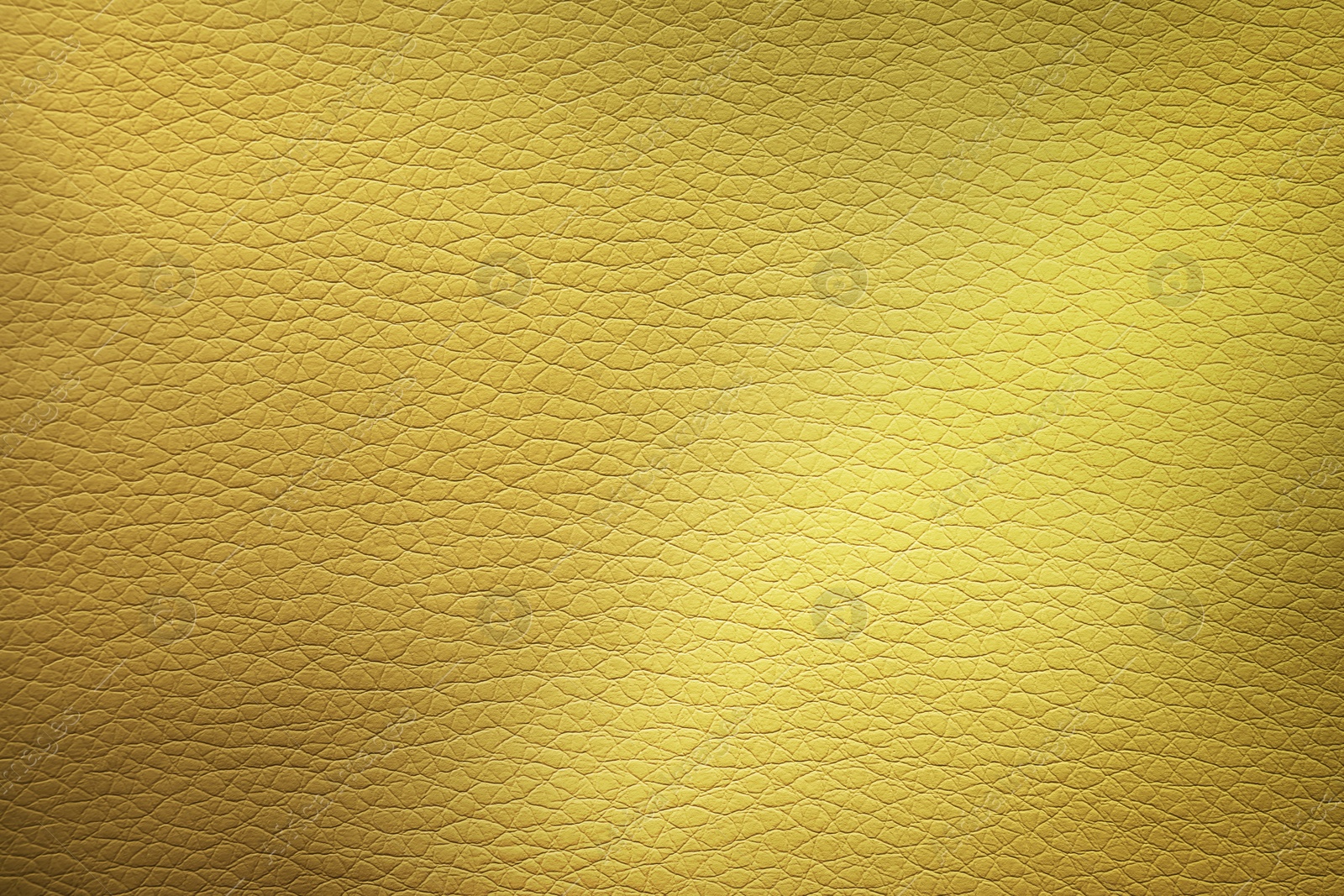 Image of Golden textured surface as background, closeup view