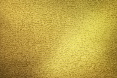 Image of Golden textured surface as background, closeup view