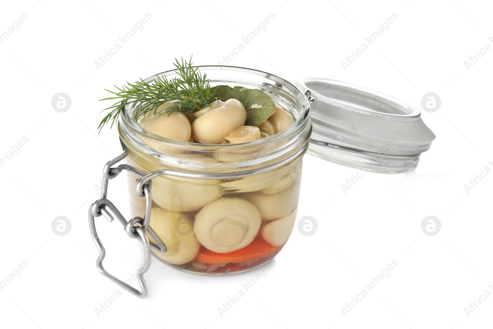 Photo of Jar with marinated mushrooms and dill isolated on white