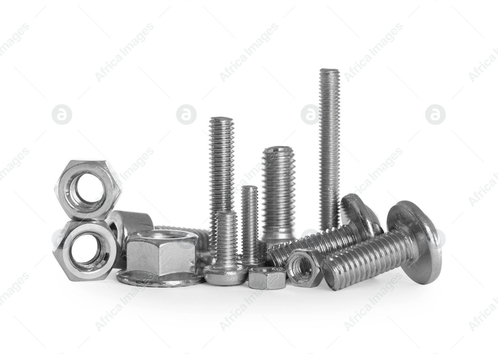 Photo of Different metal bolts and nuts on white background