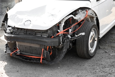 Photo of Broken car after road accident, closeup view. Auto insurance