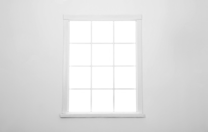 Photo of Simple vintage window on white wall indoors