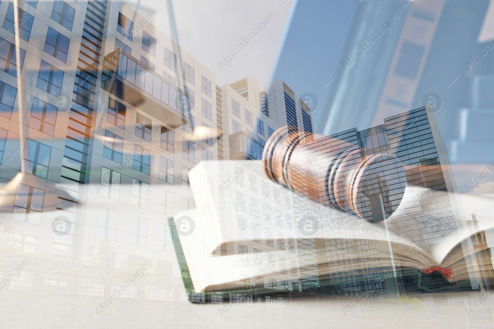 Image of Law protection. Double exposure of book with wooden gavel and buildings