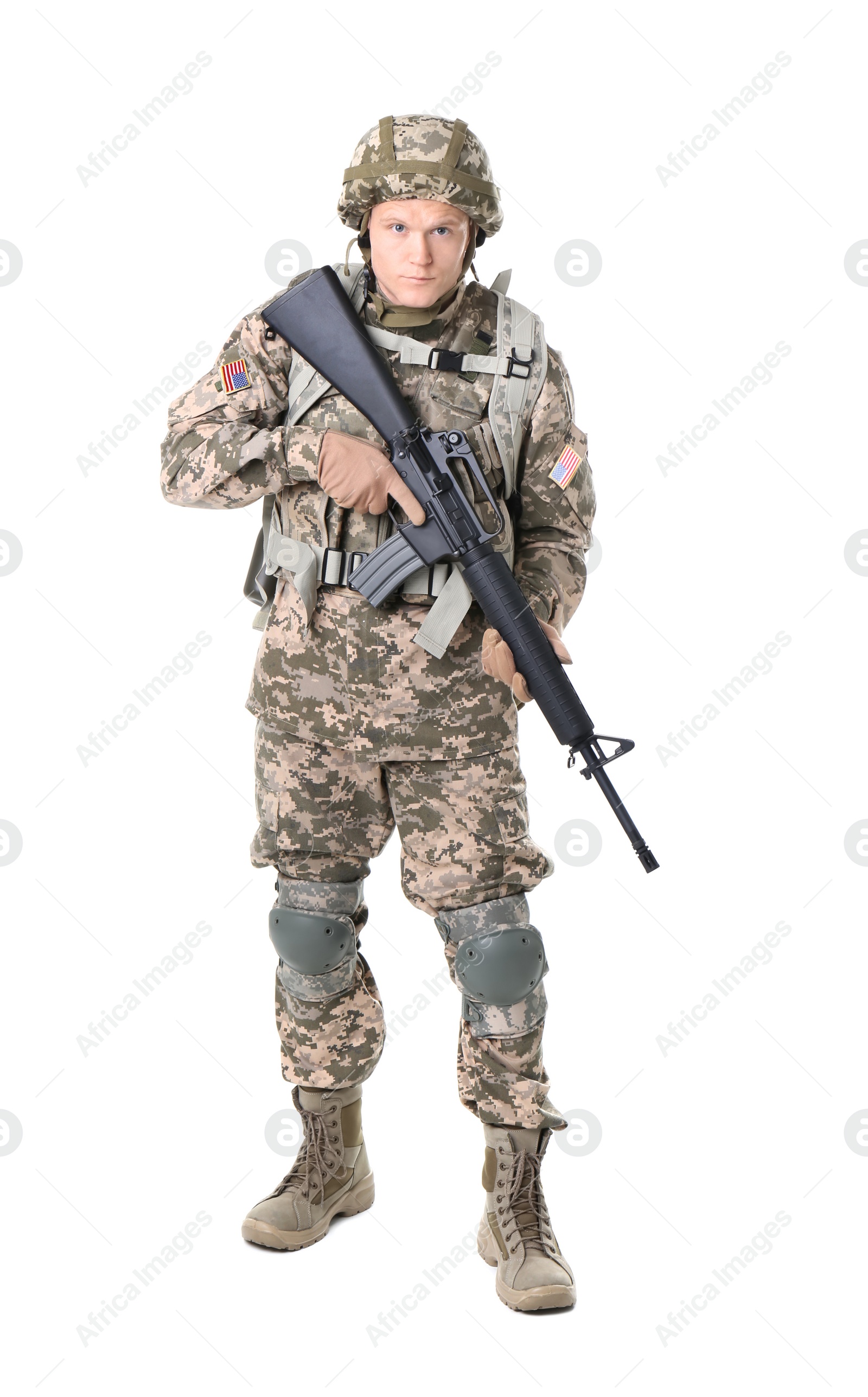 Photo of Male soldier with machine gun on white background. Military service