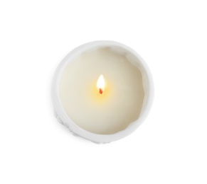 Candle in holder on white background, top view. Christmas decoration