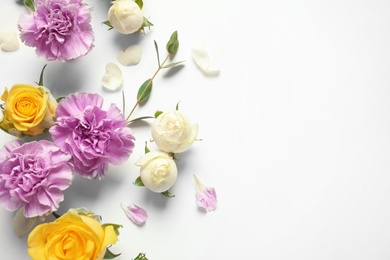 Photo of Flat lay composition with beautiful blooming flowers on white background