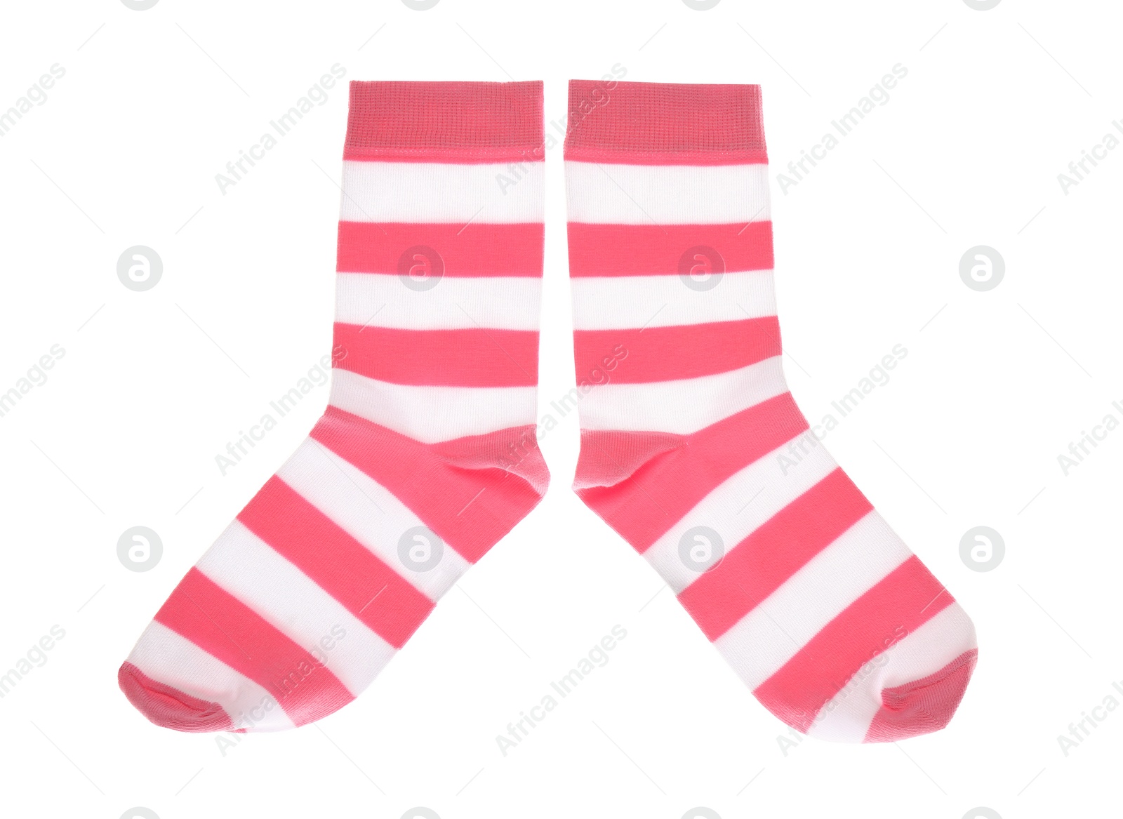 Photo of Pink striped socks on white background, top view