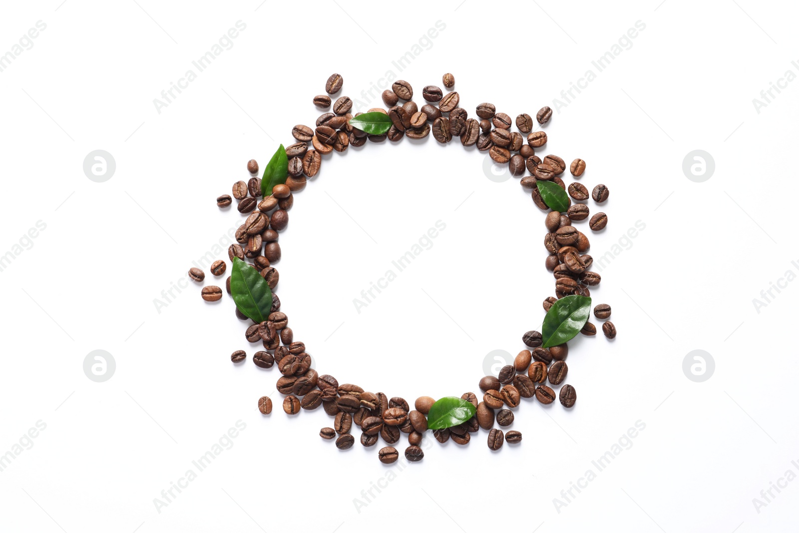 Photo of Frame made of fresh green coffee leaves and beans on white background, top view. Space for text