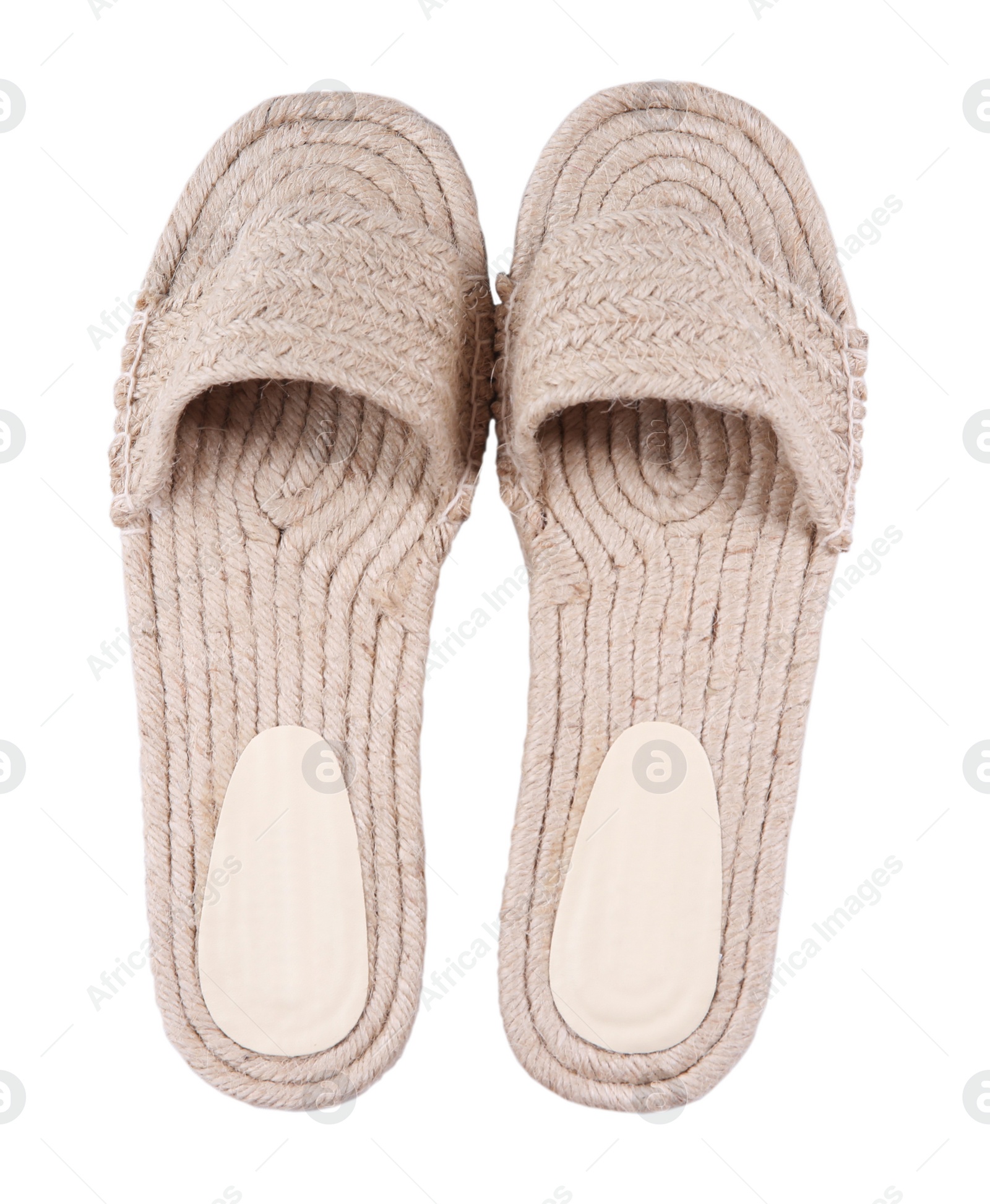 Photo of Stylish knitted shoes isolated on white, top view. Beach accessory