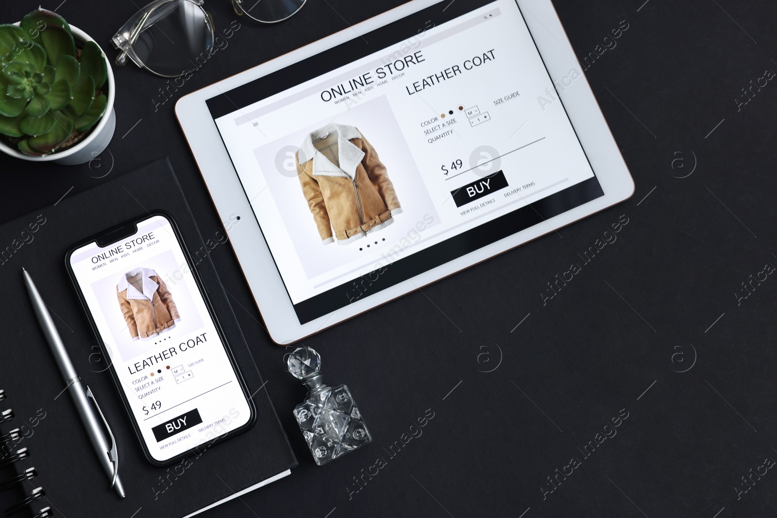 Photo of Online shopping. Flat lay composition with modern tablet and smartphone on black background