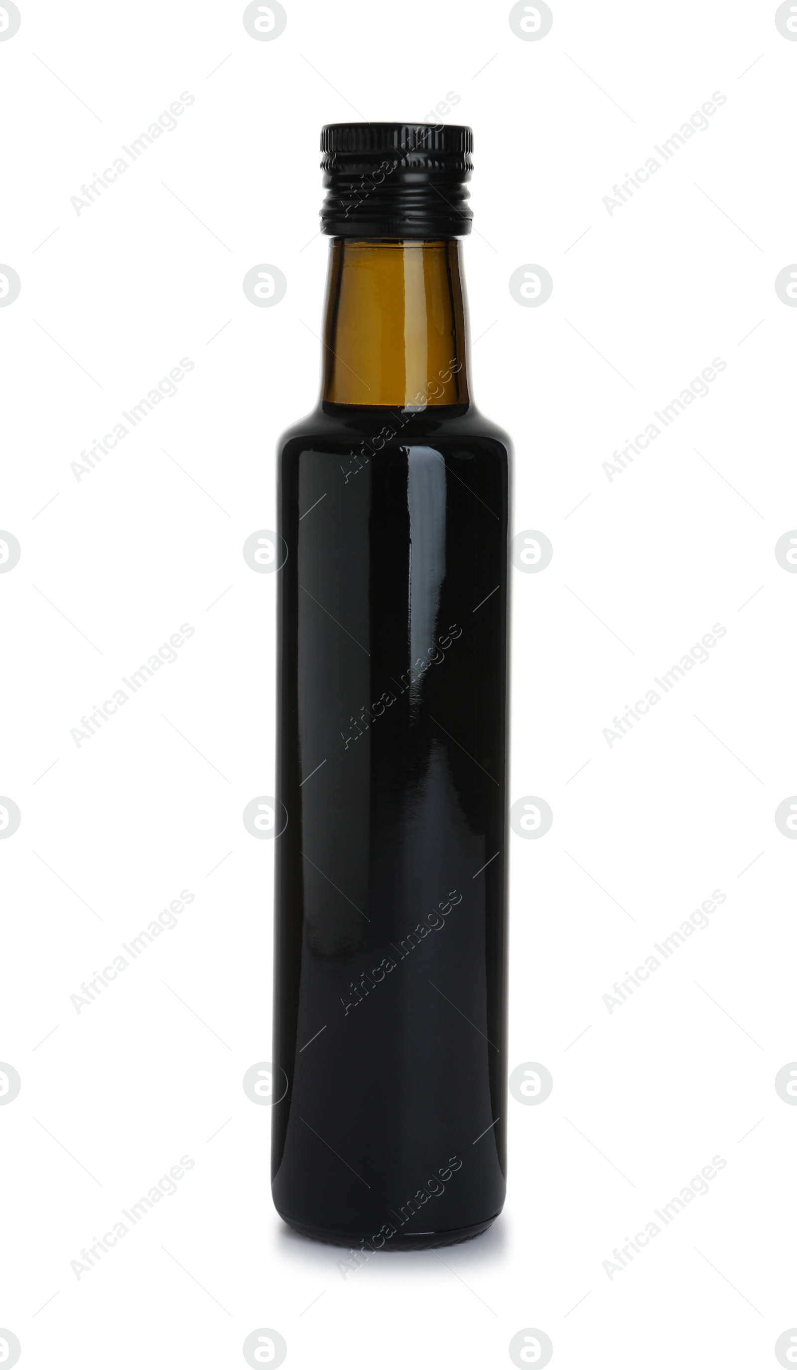 Photo of Bottle with balsamic vinegar on white background