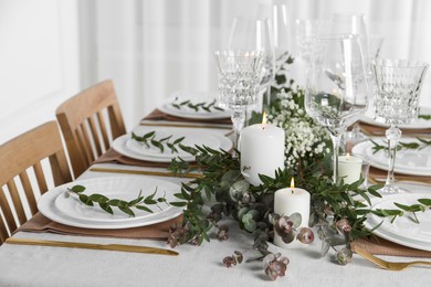 Stylish elegant table setting for festive dinner indoors