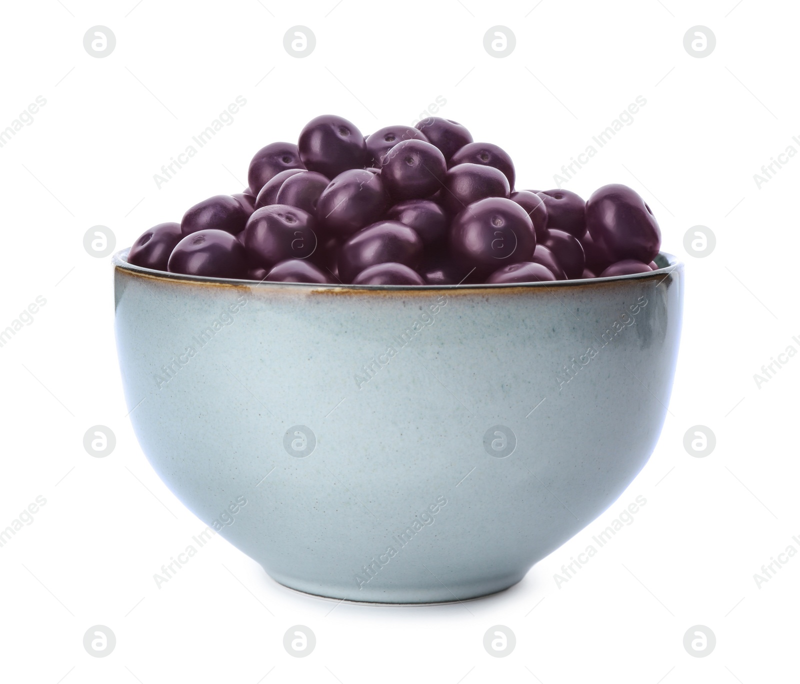 Photo of Fresh acai berries in bowl isolated on white