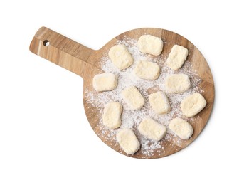 Photo of Making lazy dumplings. Wooden board with cut dough and flour isolated on white, top view