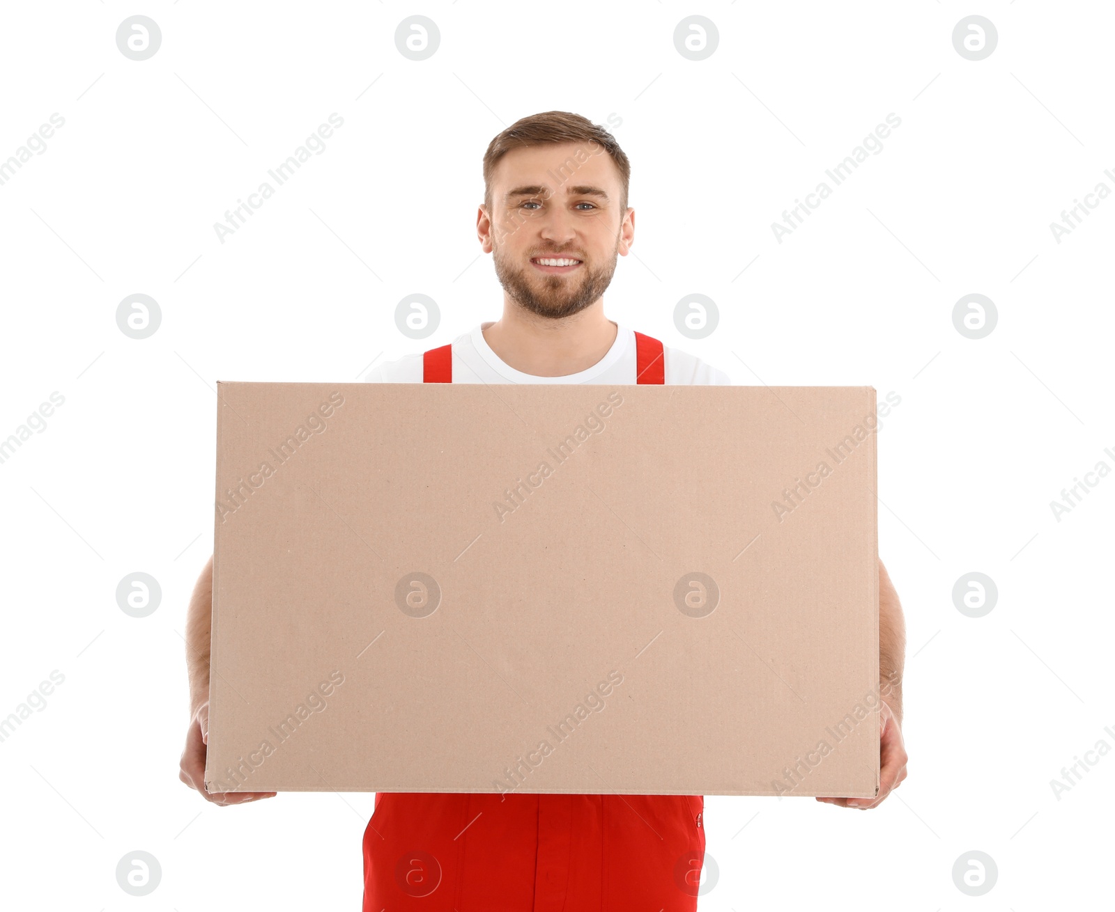 Photo of Young worker carrying box isolated on white. Moving service