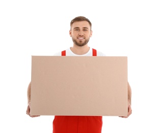 Young worker carrying box isolated on white. Moving service