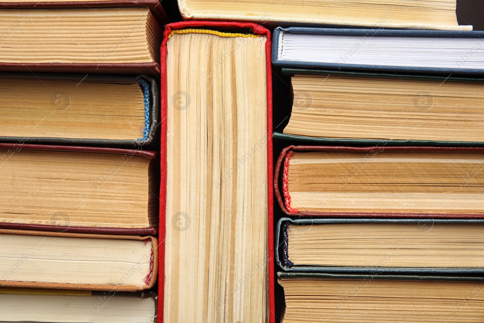 Photo of Many different hardcover books as background, top view