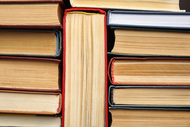 Photo of Many different hardcover books as background, top view