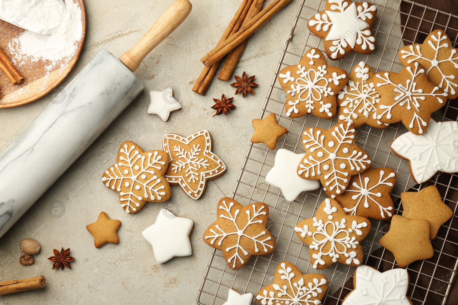 Photo of Flat lay composition with tasty Christmas cookies and spices on light table