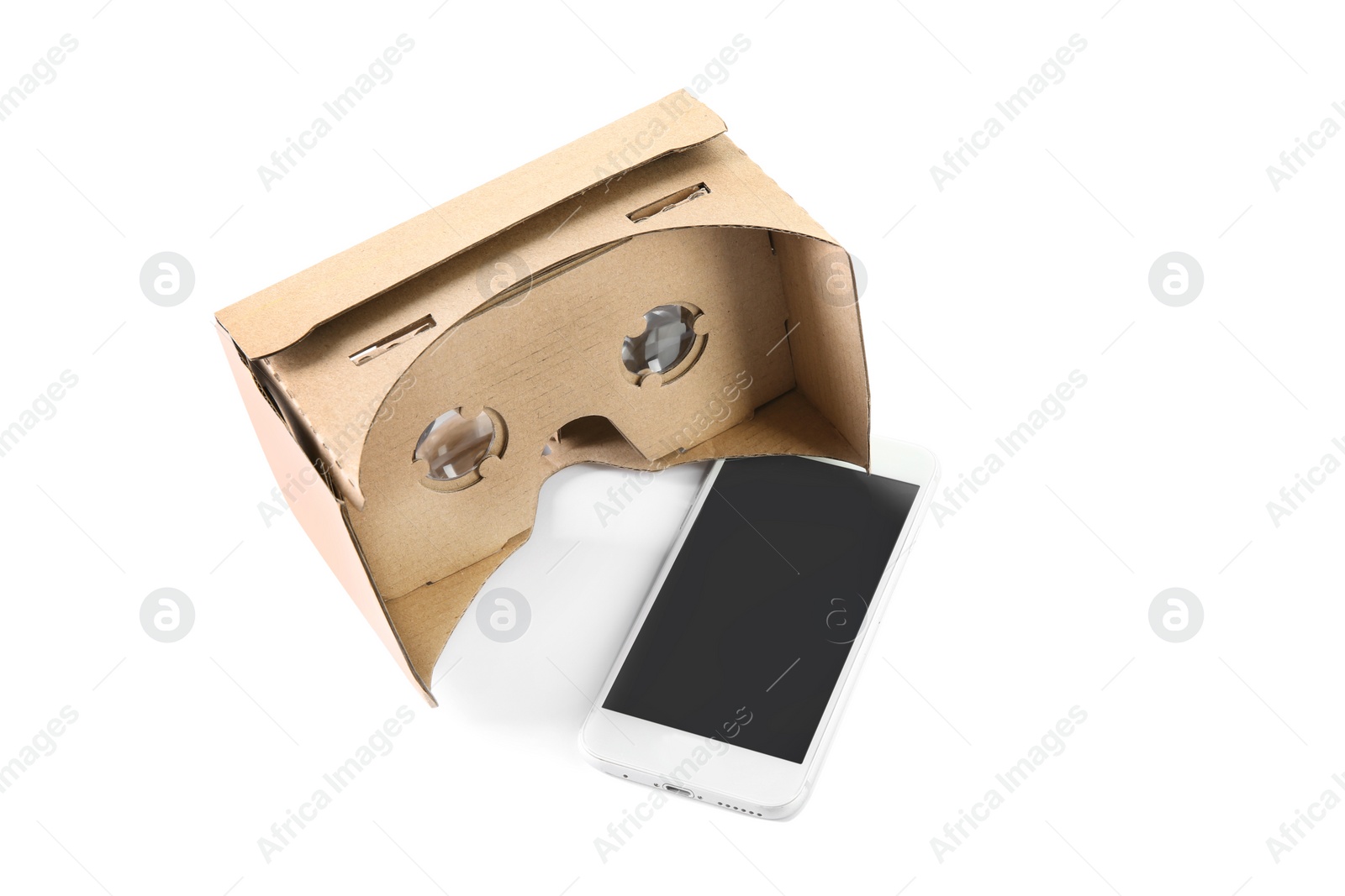 Photo of Cardboard virtual reality headset and smartphone on white background