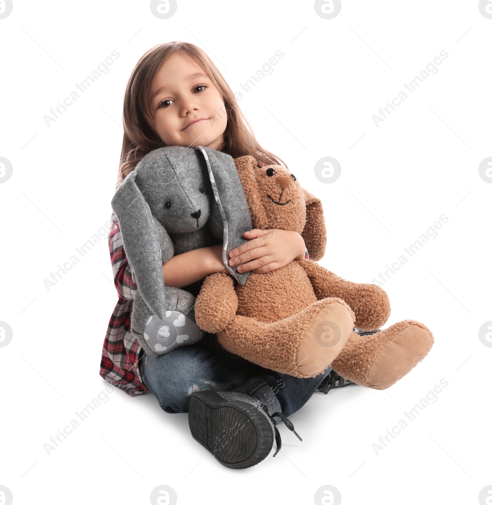 Photo of Cute little girl with toys on white background