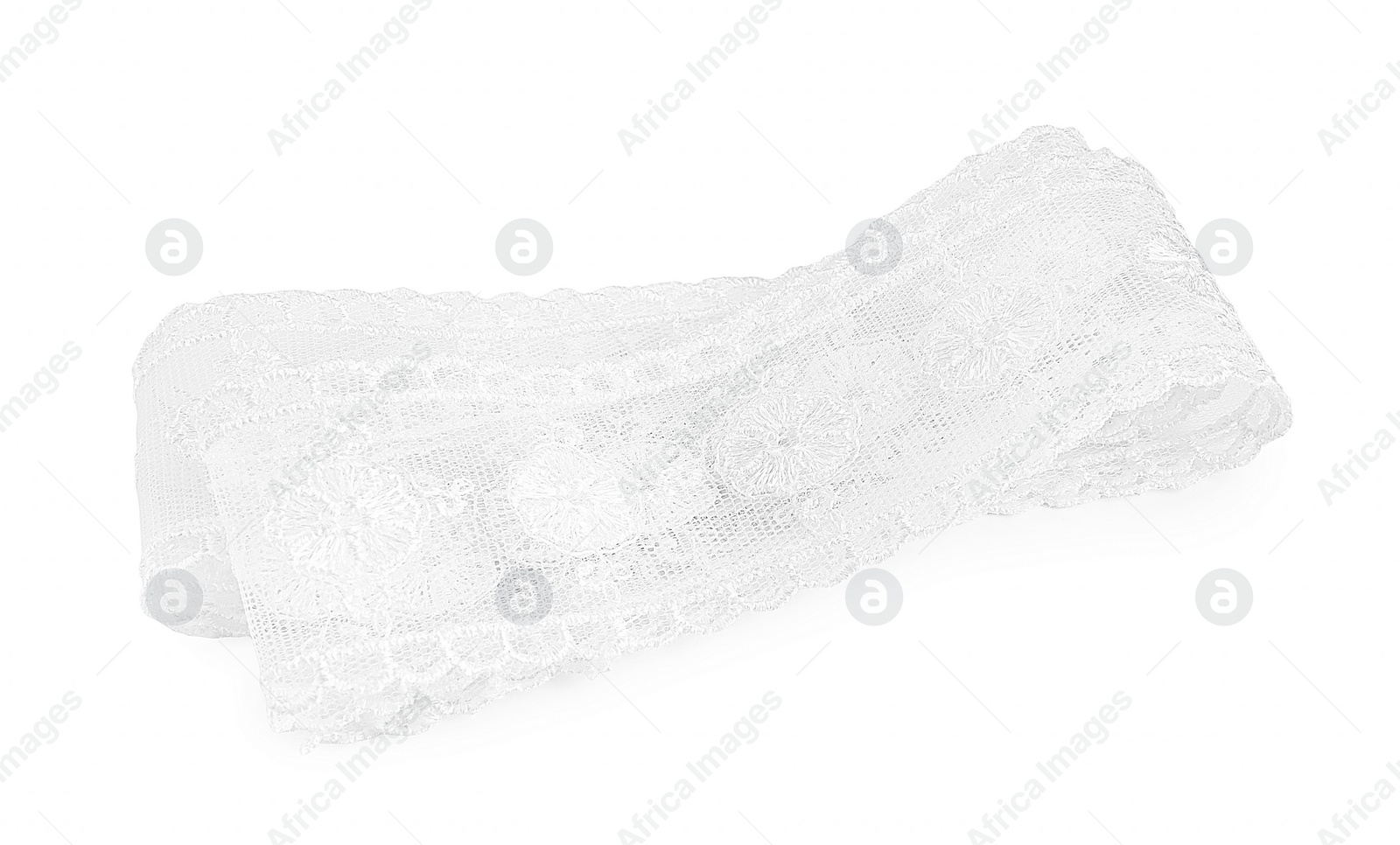 Photo of Beautiful lace with pattern isolated on white